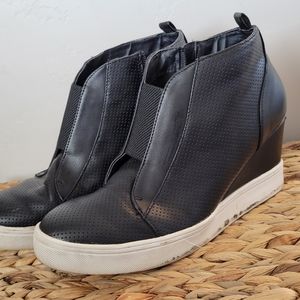 Mia black sneaker wedge.